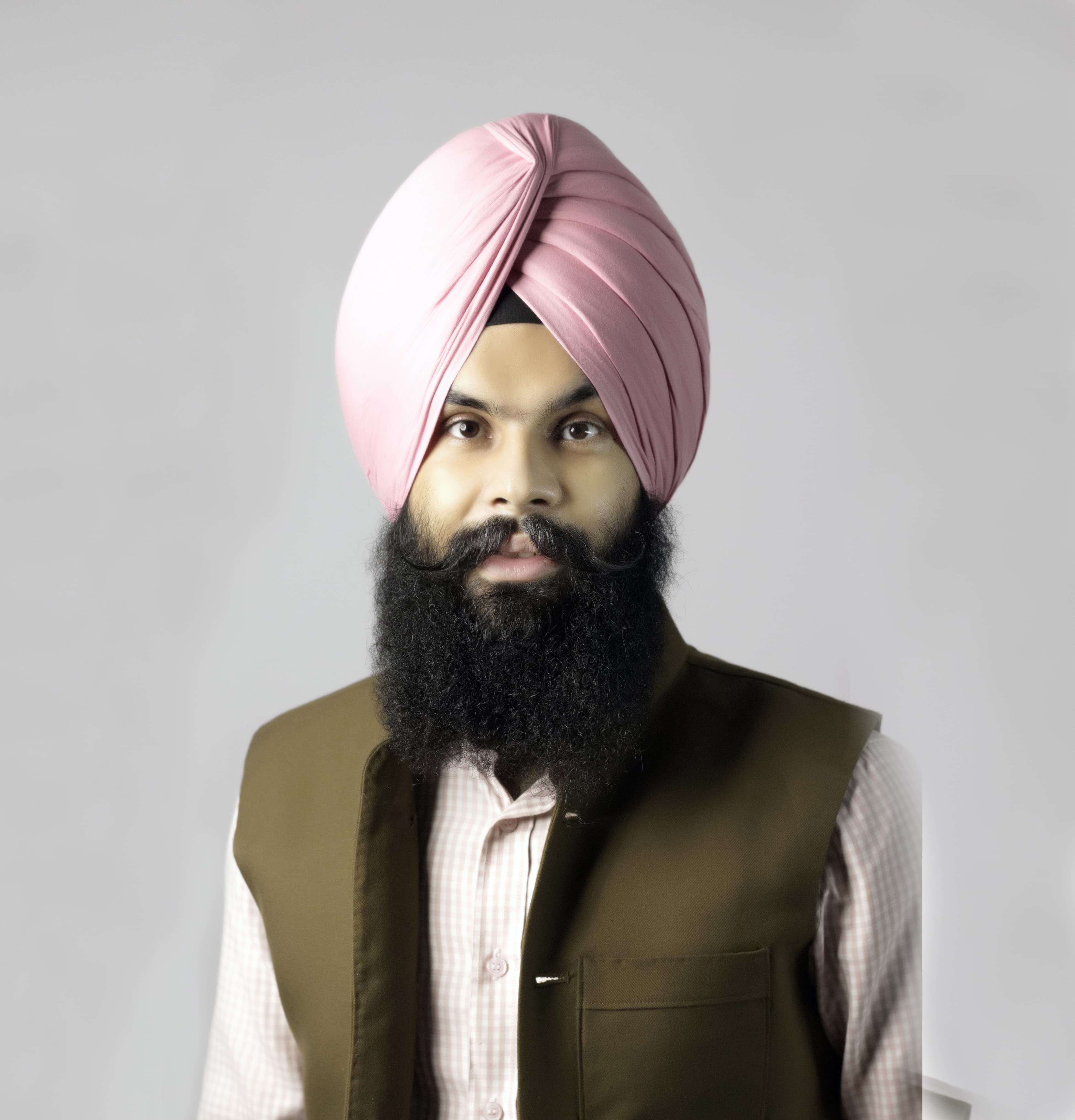 Portrait of Raman Sandhu, Founding Director & CEO